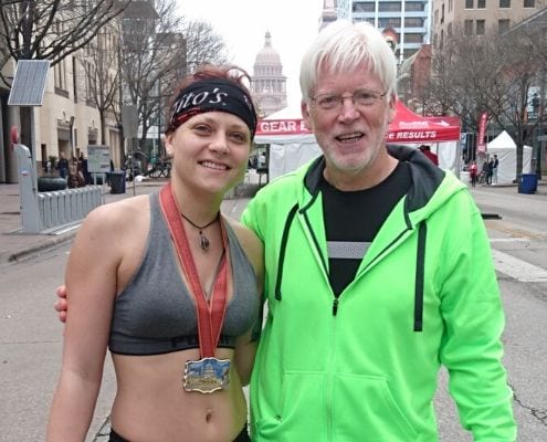 Axel Reissnecker and Anja, his daughter, after completing the 2018 Austin Marathon. Axel's love for running helped him defeat Stage IV cancer.