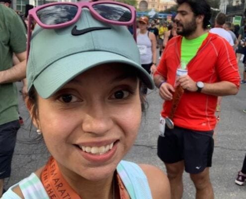 Rebecca Galvan at the 2018 Austin Half Marathon finish line, after she beat ulcerative colitis.