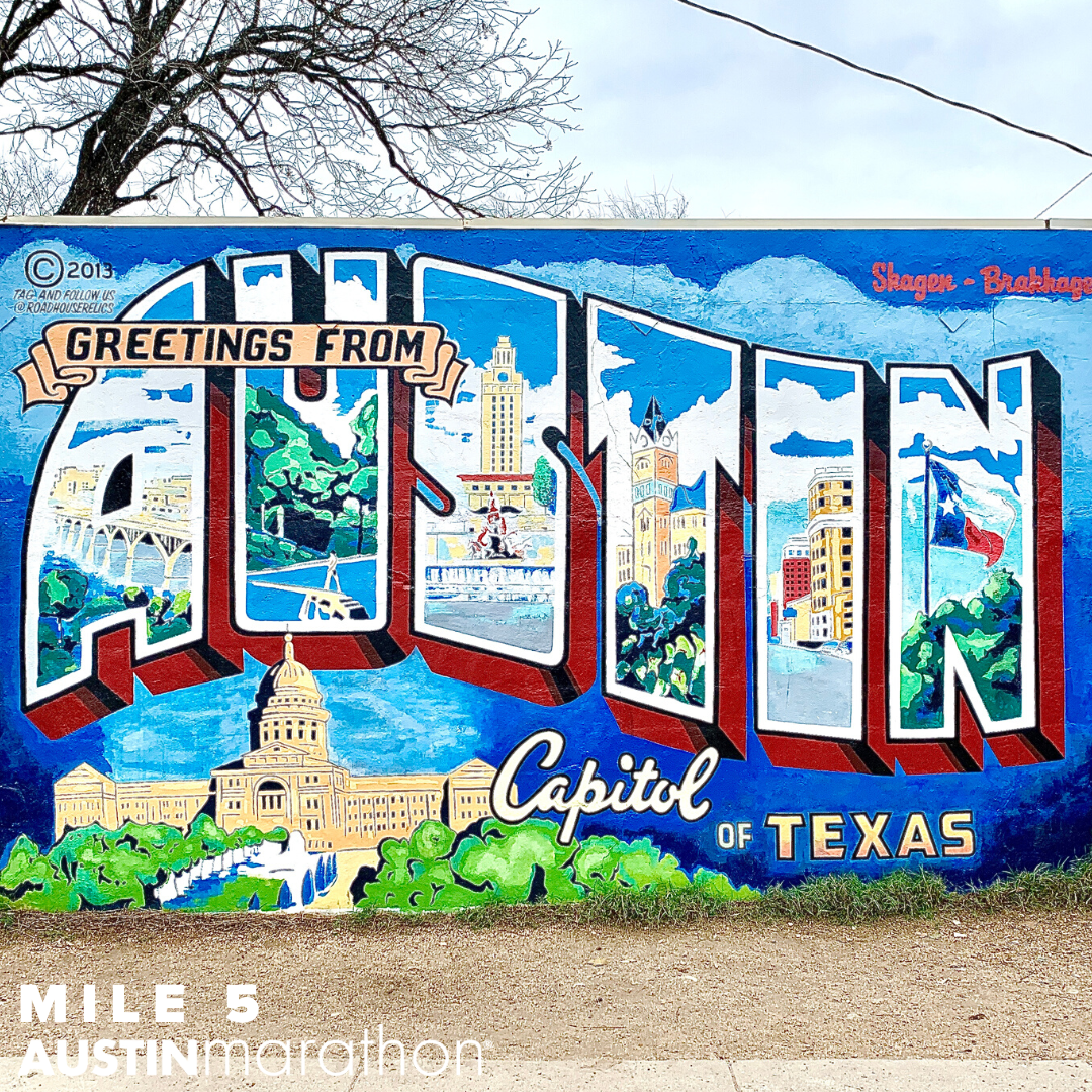 Image of the Greeting From Austin mural in Austin. It's one of the Austin Marathon's favorite on-course murals.