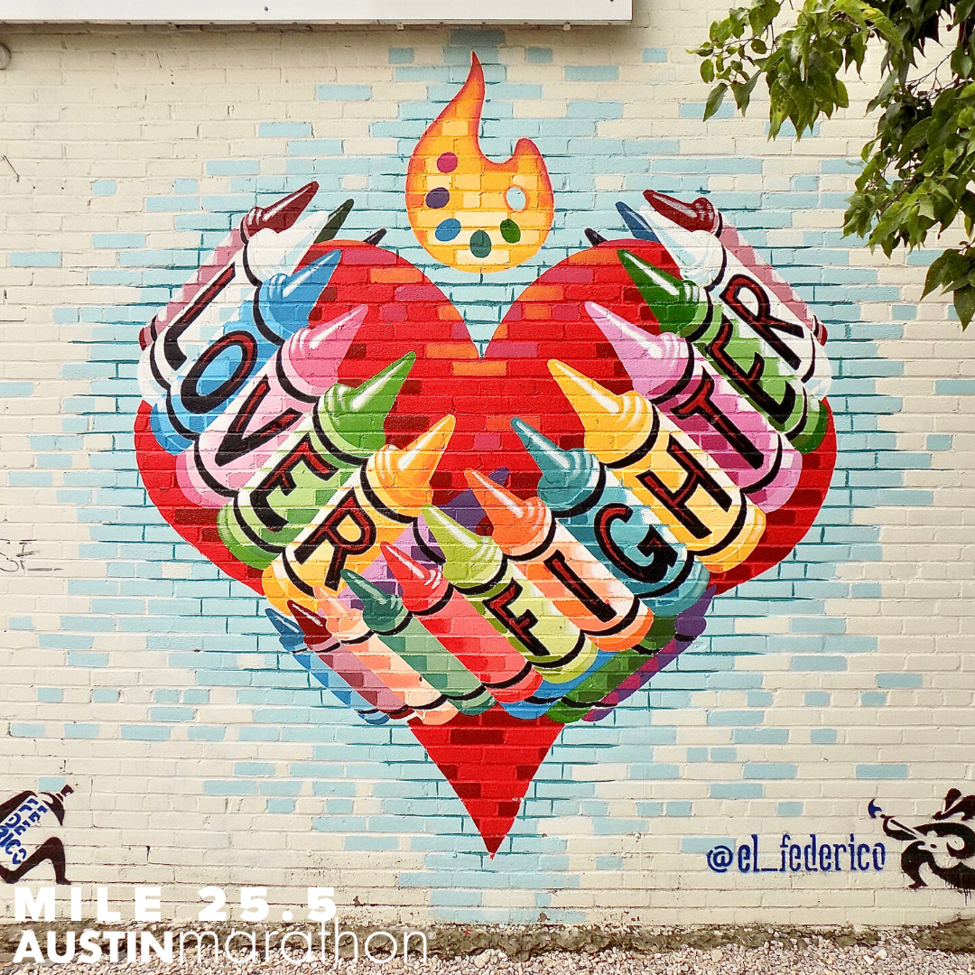 Image of the Lover Fighter mural in Austin. It's one of the Austin Marathon's favorite on-course murals.