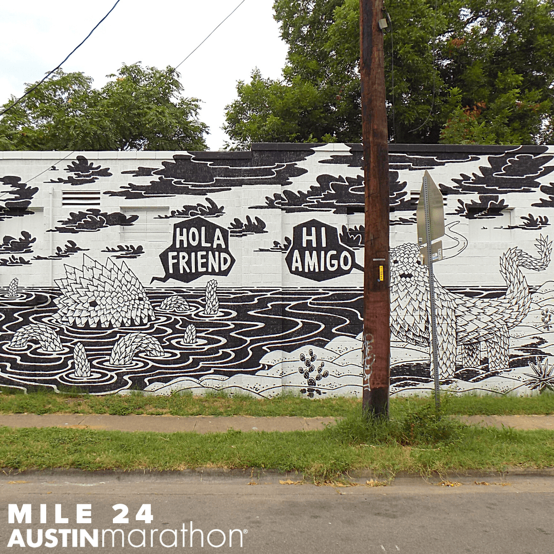 Image of the Hola Friend, Hi Amigo mural in Austin. It's one of the Austin Marathon's favorite on-course murals.