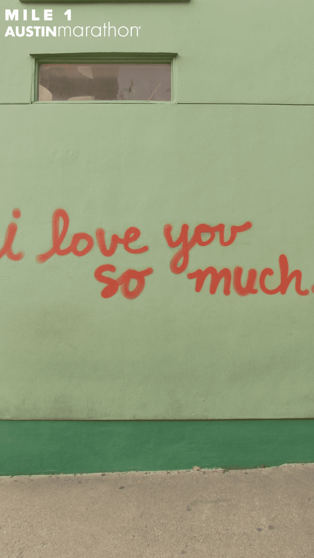 Image of i love you so much mural in Austin. It's one of the Austin Marathon's favorite on-course murals and sized for Instagram Stories so users can upload the image and take a selfie with the mural using Instagram's green screen effect.