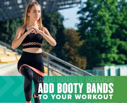 Female runner works out with a booty band, or resistance band. Text in design reads Add Booty Bands to Your Workout. Learn more at https://youraustinmarathon.com/booty-bands-benefits/