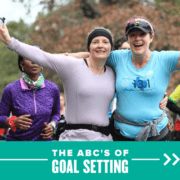 920727_AustinMarathon2021ABCsofGoalSettingFeature_121620 Two women happily stand side-by-side with their arms in the air during the 2020 Ascension Seton Austin Marathon. Text on design reads The ABCs of Goal Setting. Learn more at http://48d.435.myftpupload.com/goal-setting/