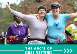 Two women happily stand side-by-side with their arms in the air during the 2020 Ascension Seton Austin Marathon. Text on design reads The ABCs of Goal Setting. Learn more at http://48d.435.myftpupload.com/goal-setting/
