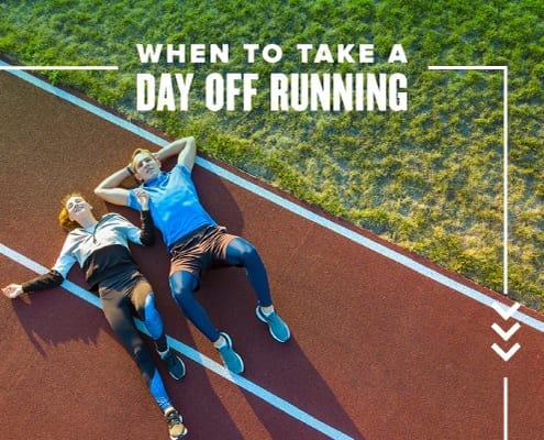 Male and female runner lay on the track after a workout. Text on design reads When to Take a Day Off Running. Read more at http://48d.435.myftpupload.com/take-a-day-off/