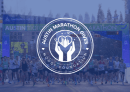 Runners starting Austin Marathon with charity logo