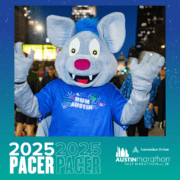 A person wearing a blue mouse mascot costume stands at a city street event, dressed in a blue "Run Austin" T-shirt. Text on the image reads "2025 Pacer Group" and "Austin Marathon Half Marathon and 5K." Logos for Ascension Seton and the event are also present. Meet your new race cheerleader! Austin Marathon Half Marathon & 5K
