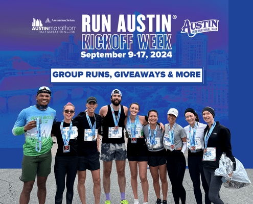 Group of runners, filled with excitement, pose with medals and bibs after a race, standing in front of a promotional banner for the "2025 Austin Marathon Launch Week" from September 9-17. The banner highlights upcoming events like group runs, giveaways, special offers, and more. Austin Marathon Half Marathon & 5K