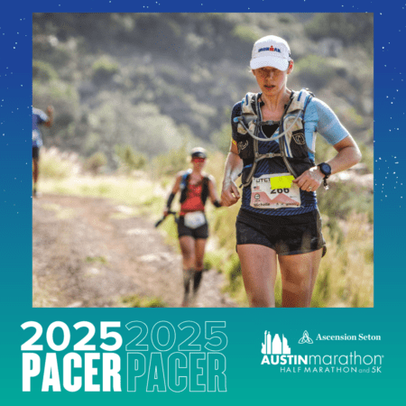 Two runners in a marathon on a dirt trail navigate through the natural landscape as part of the 2025 Austin Marathon. Leading, the woman wearing a hydration vest and race bib number 200 sets the pace, with trees and hills in the background. The image highlights Pacer Group sponsorship graphics. Austin Marathon Half Marathon & 5K