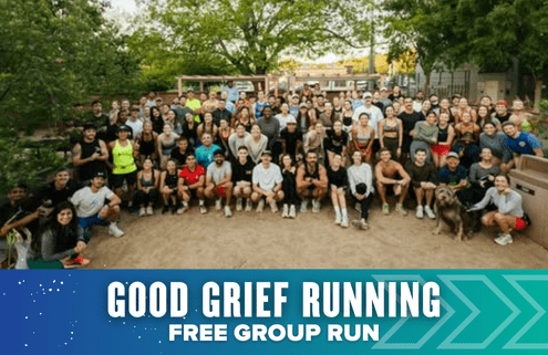A large group of people pose together outdoors in a park, ready for a group run. The bottom banner reads, "GOOD GRIEF RUNNING FREE GROUP RUN" with blue and teal graphics—celebrating launch week ahead of the Austin Marathon. Austin Marathon Half Marathon & 5K
