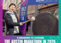 A smiling runner wearing a medal strikes a large gong at an outdoor event. Race distance signs for 26.2, 13.1, and 5K are visible. Text: "5 reasons to choose the Austin Marathon in 2026. Austin Marathon Half Marathon & 5K