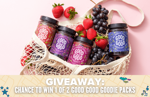 A mesh bag filled with jars of Good Good jams, fresh strawberries, and grapes sits on a pink background. Text below reads: "GIVEAWAY: Your chance to win jams in 1 of 2 GOOD GOOD Goodie packs!. Austin Marathon Half Marathon & 5K