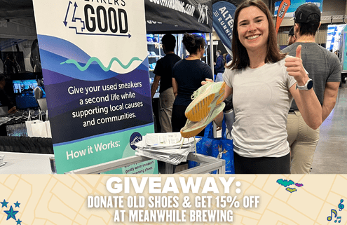 A smiling woman gives a thumbs up while holding sneakers at a Sneakers4Good donation booth. A sign encourages giving used shoes to support local causes, and a banner offers 15% off at Meanwhile Brewing for shoe donations. Austin Marathon Half Marathon & 5K