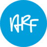 White handwritten-style letters "NRF" centered on a solid blue circular background, perfect for promoting Run For Charity events and non-profit fundraising campaigns. Austin Marathon Half Marathon & 5K