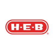 The H-E-B logo, often seen at events as sponsors, features bold white letters "H-E-B" inside a red, rounded rectangle with a white border on a light gray background. Austin Marathon Half Marathon & 5K