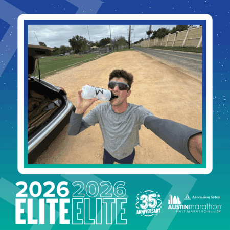 A man wearing sunglasses and a gray shirt drinks from a water bottle next to an open car trunk on a dirt path. The image features a teal border with