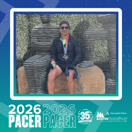 A man in athletic wear and sunglasses sits on a stone sculpture, smiling with a medal. The image, framed with 2026 Austin Marathon 35th Anniversary graphics, highlights him as part of the Pacer Group and features the word