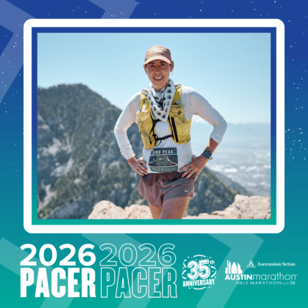 A smiling runner in athletic gear and a cap stands on a mountain trail, hands on hips, with trees and mountains in the background. Graphic text: