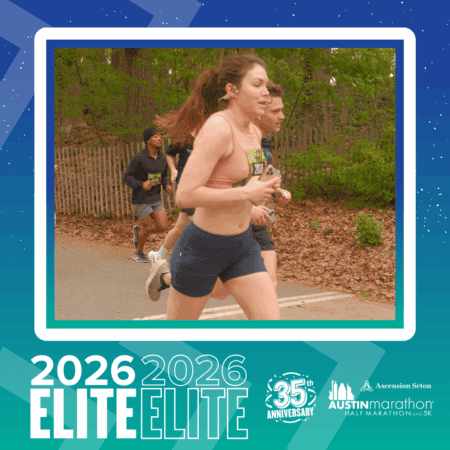 A group of runners, part of the 2026 Elite Group, including a woman in a peach sports bra and navy shorts, race past trees and a wooden fence. The image features