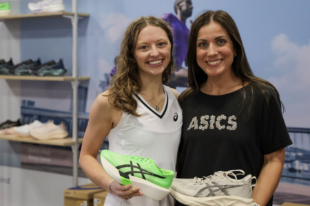 Two women smiling with ASICS running shoes Two women smiling with ASICS running shoes