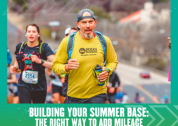 Male runner holding water bottle in race