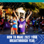 Marathon runner celebrating with arms raised