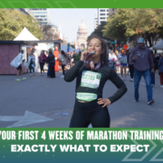 A woman wearing a race bib stands in the street, smiling and holding a medal after completing her Marathon Training. Text reads: “Your first 4 weeks of marathon training: Exactly what to expect.” People and trees are visible in the background. Austin Marathon Half Marathon & 5K