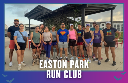 A diverse group of people and two dogs stand and smile together outdoors under a pavilion in South Austin, wearing athletic clothing. Text reads “EASTON PARK RUN CLUB” at the bottom of the image. Austin Marathon Half Marathon & 5K