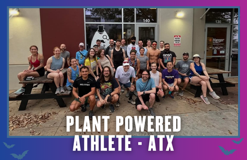 A group of people poses together on and around picnic benches outside a building, celebrating KickOff Week. The text at the bottom reads, “Plant Powered Athlete - ATX.” The border is purple and blue with small bat icons. Austin Marathon Half Marathon & 5K